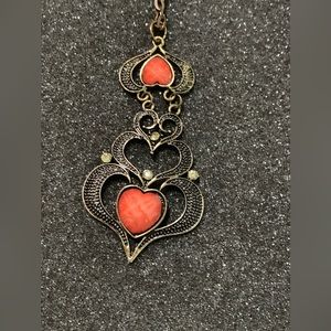 Antique looking heart necklace.